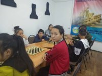 Общественное сообщество Мүшелтой для детей и подростков 23 ноября провела дружественый  турнир по шашкам и шахматам.
